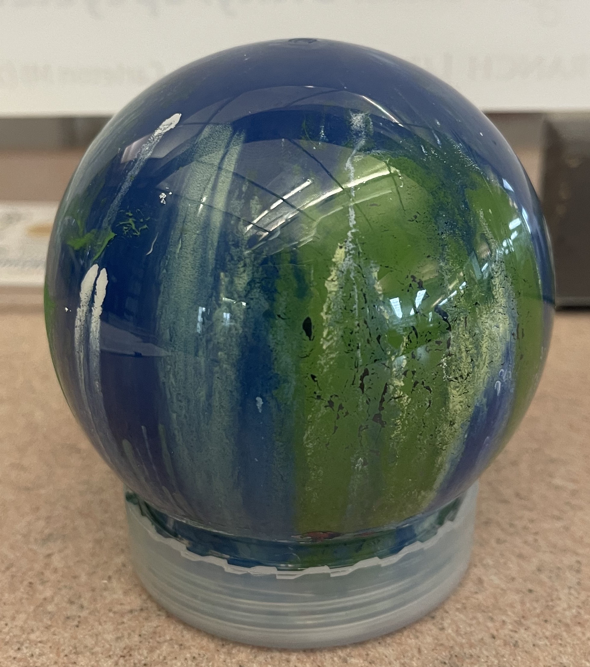 Image of the finished painted swirl globe