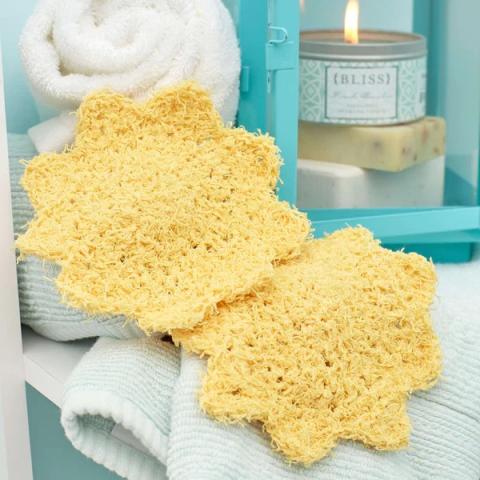 Two crochet sunshine washcloths